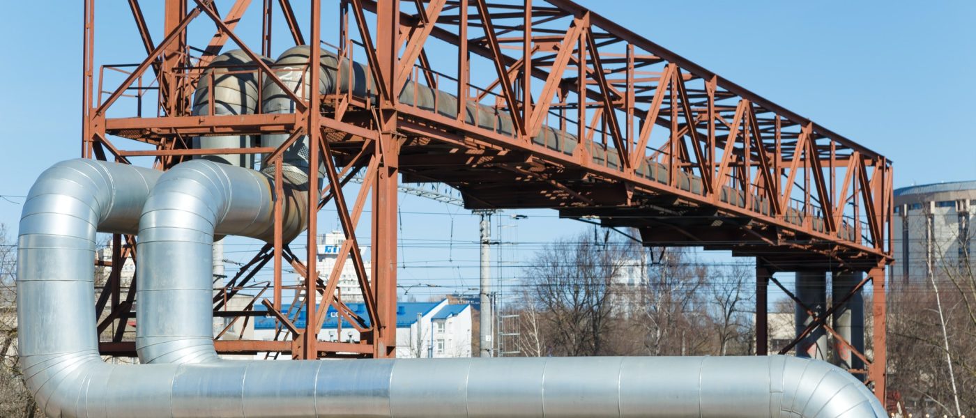 Industrial huge pipes on metal viaduct outdoor